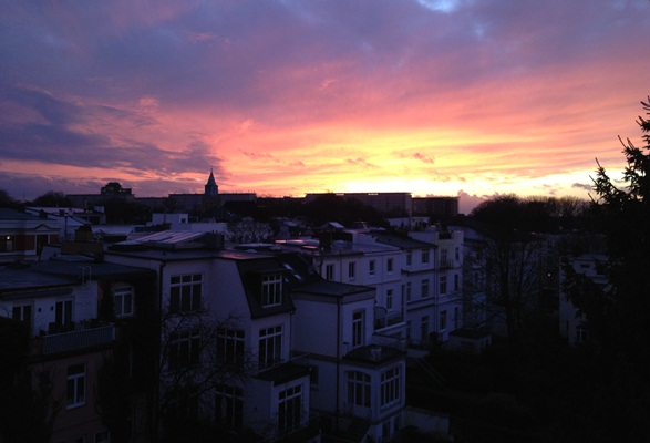 It had been raining all day. Now the storm colors the clouds with shades of red. It had been raining all day. Now the storm colors the clouds with shades of red.